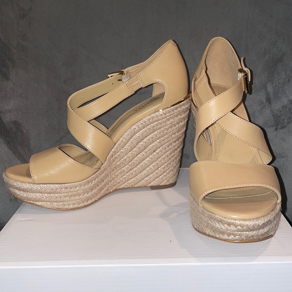 Brand new Michael Kors Abbott Wedge - Size 6